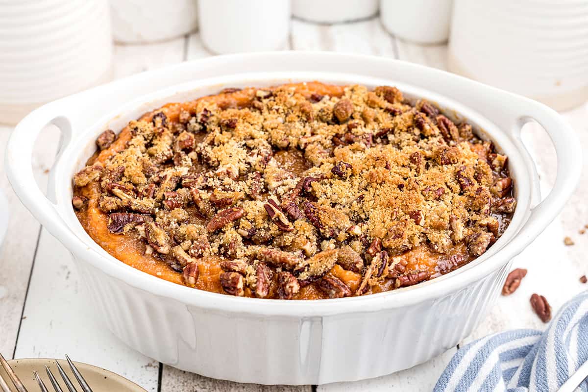 Sweet potato casserole in a white baking dish.