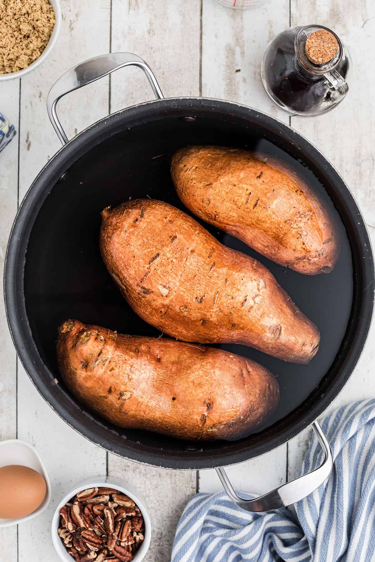 Sweet potatoes and water in a pot.