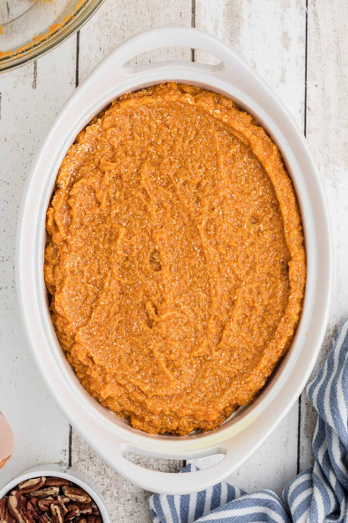 Sweet potato mixture spread in a baking dish.