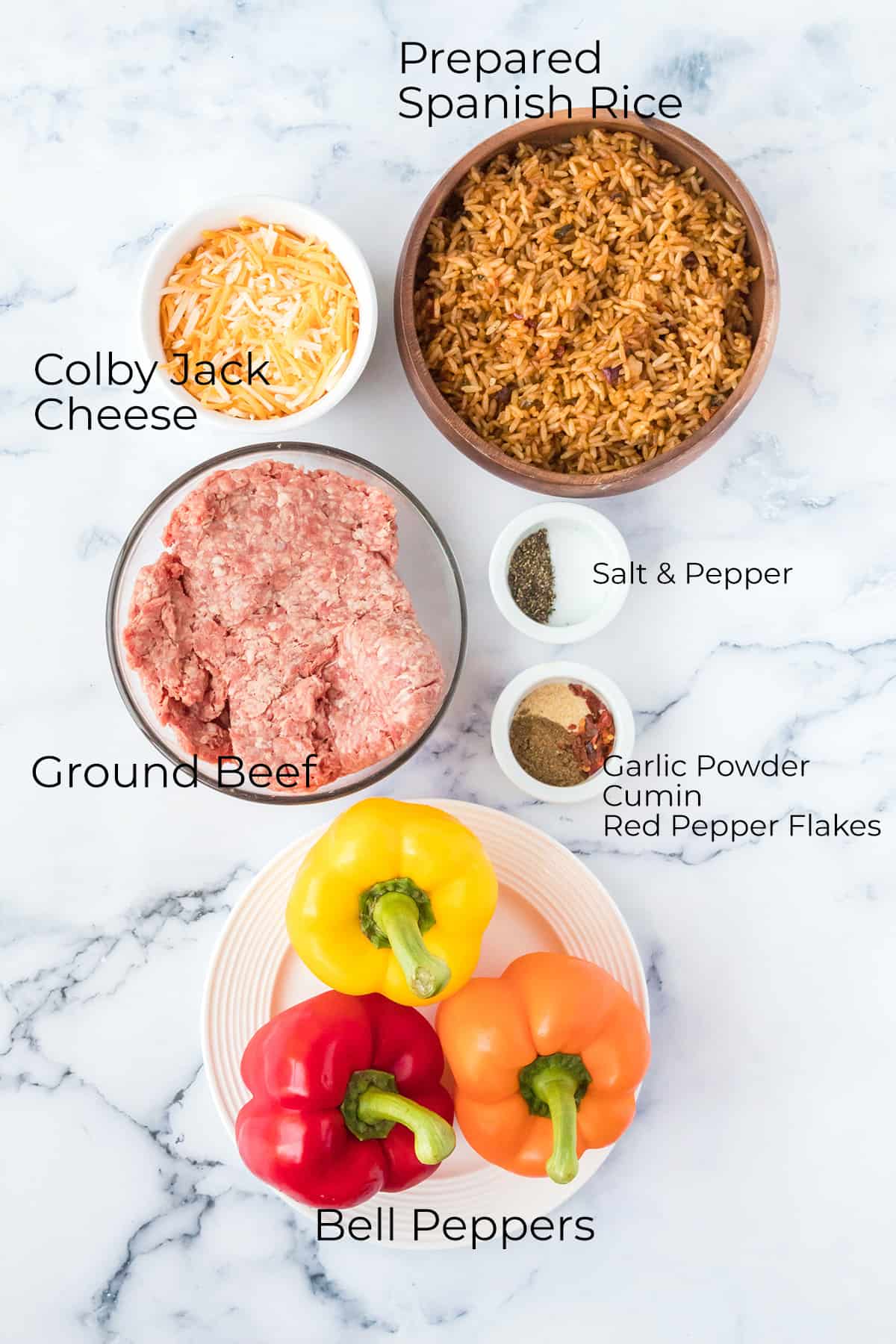 All ingredients needed to make stuffed bell peppers.