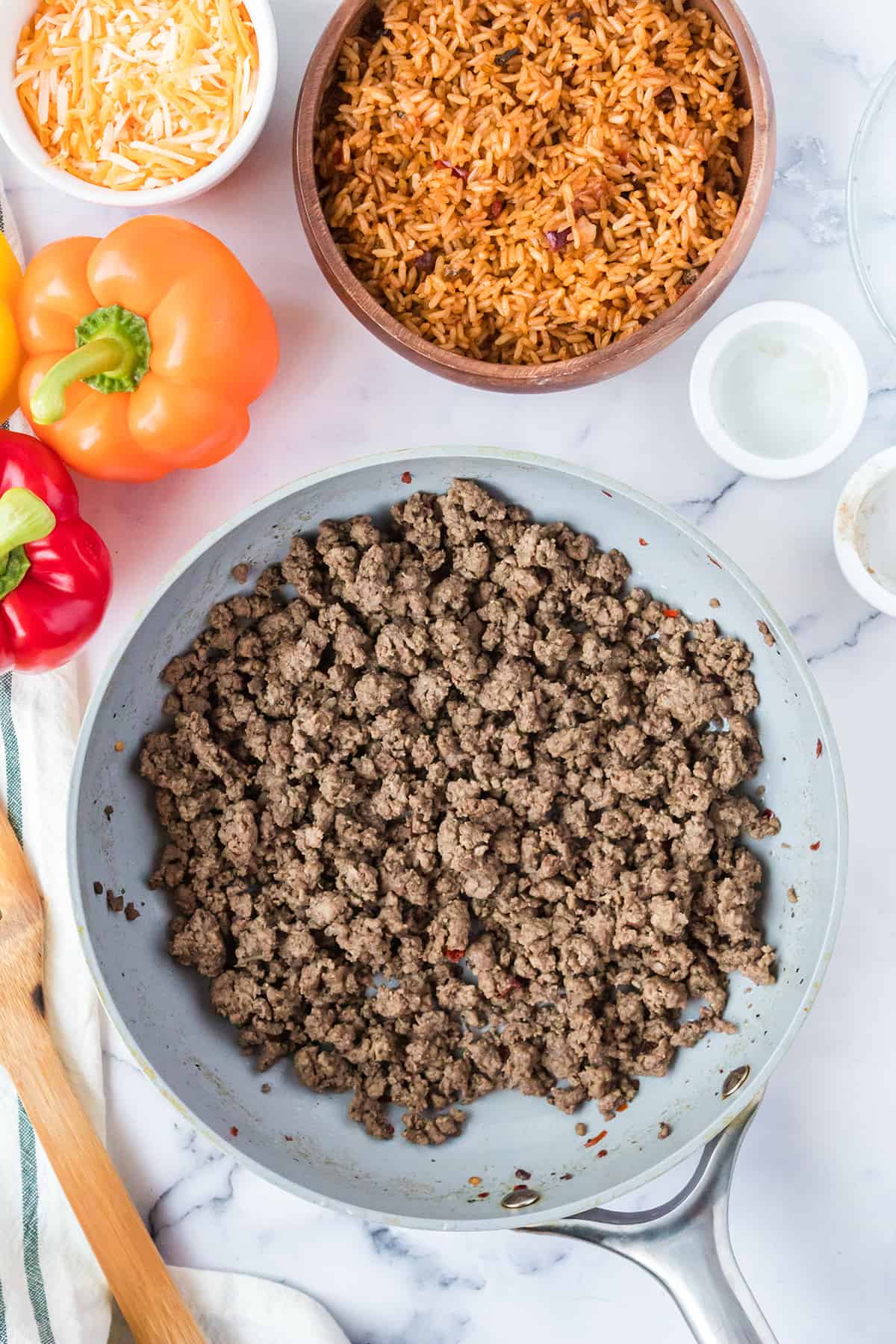 Cooked ground beef in a skillet.