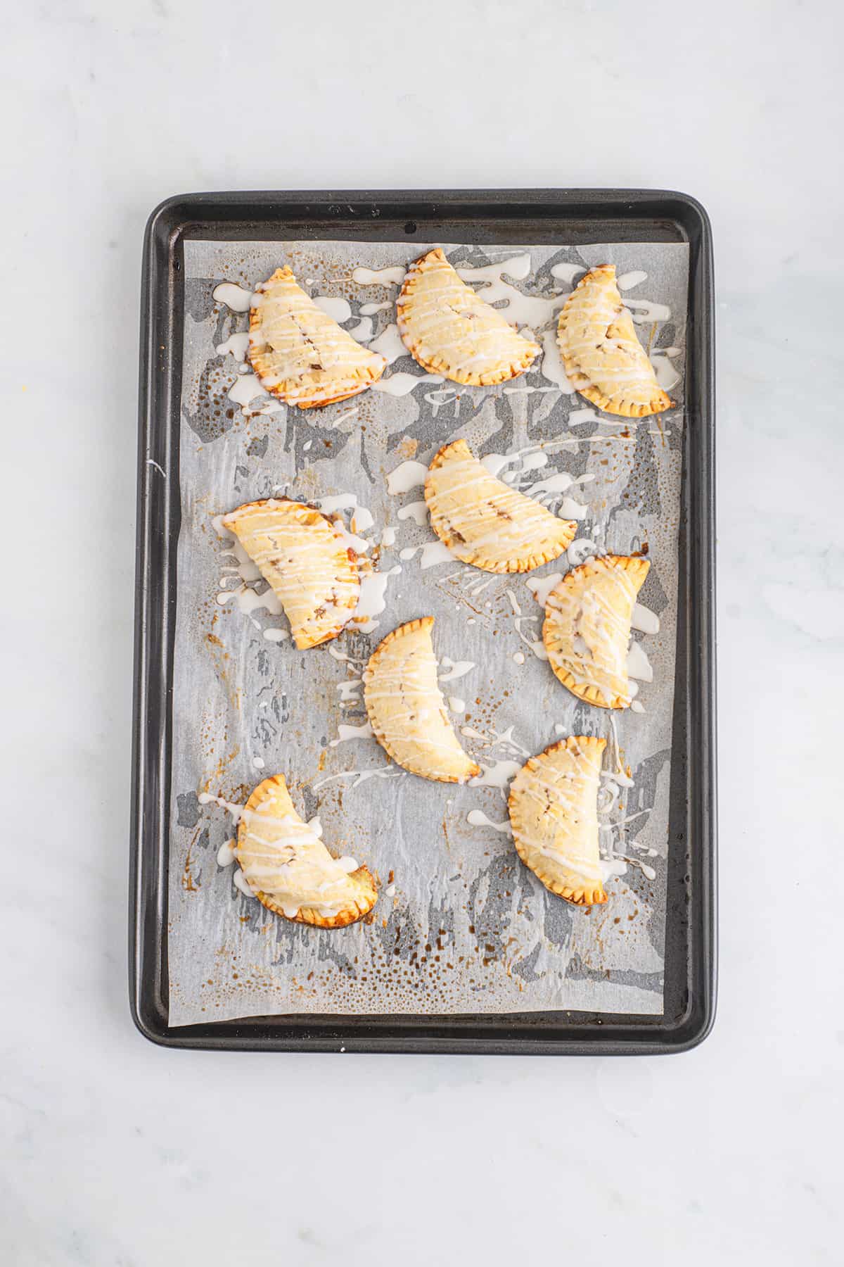 Finished pies with glaze mixture applied.