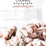 Crinkle cookies stacked on a white plate.