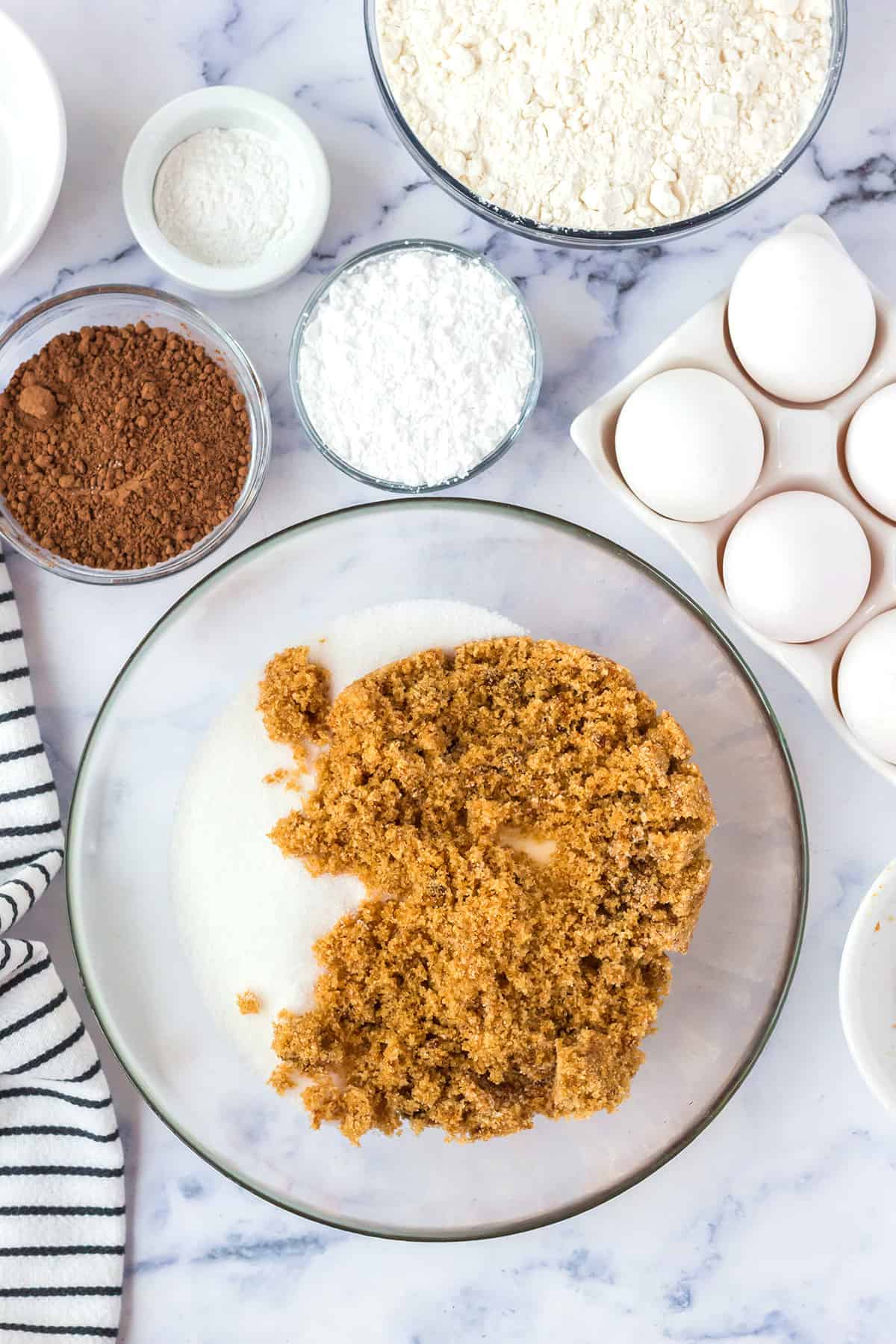 White and brown sugar in a mixing bowl.