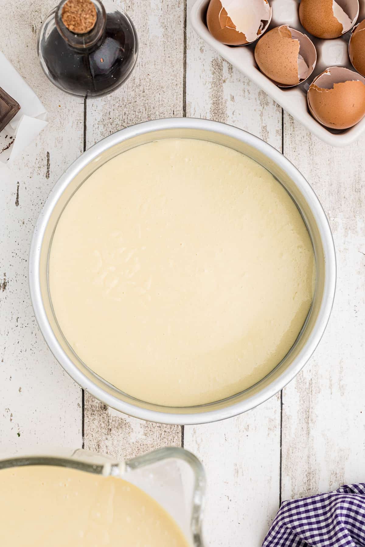 Batter poured into a prepared cake pan.