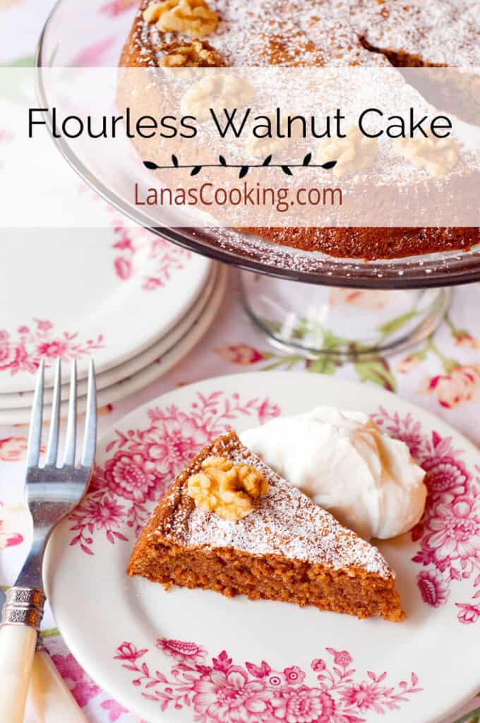 A slice of flourless walnut cake on a serving plate.