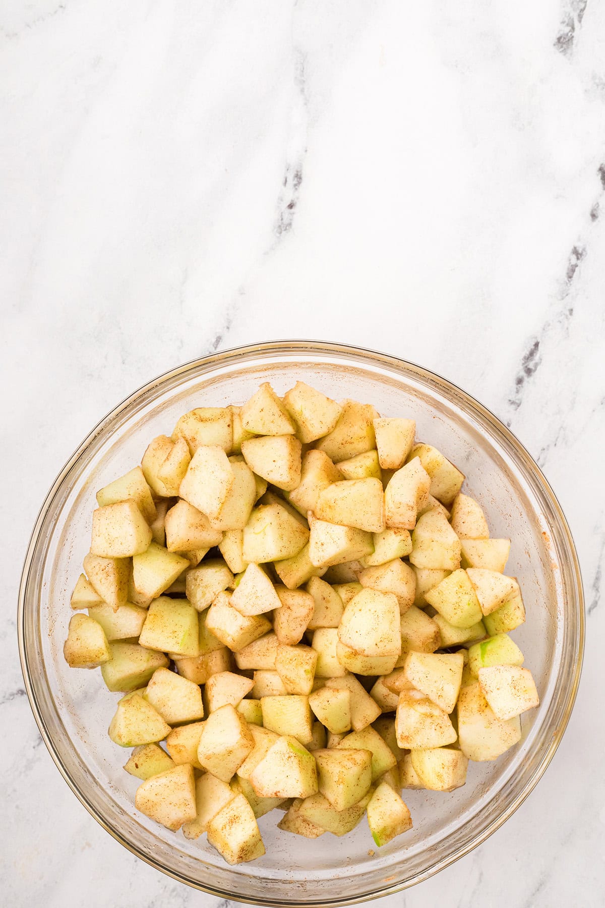 Prepped apples tossed with spices.