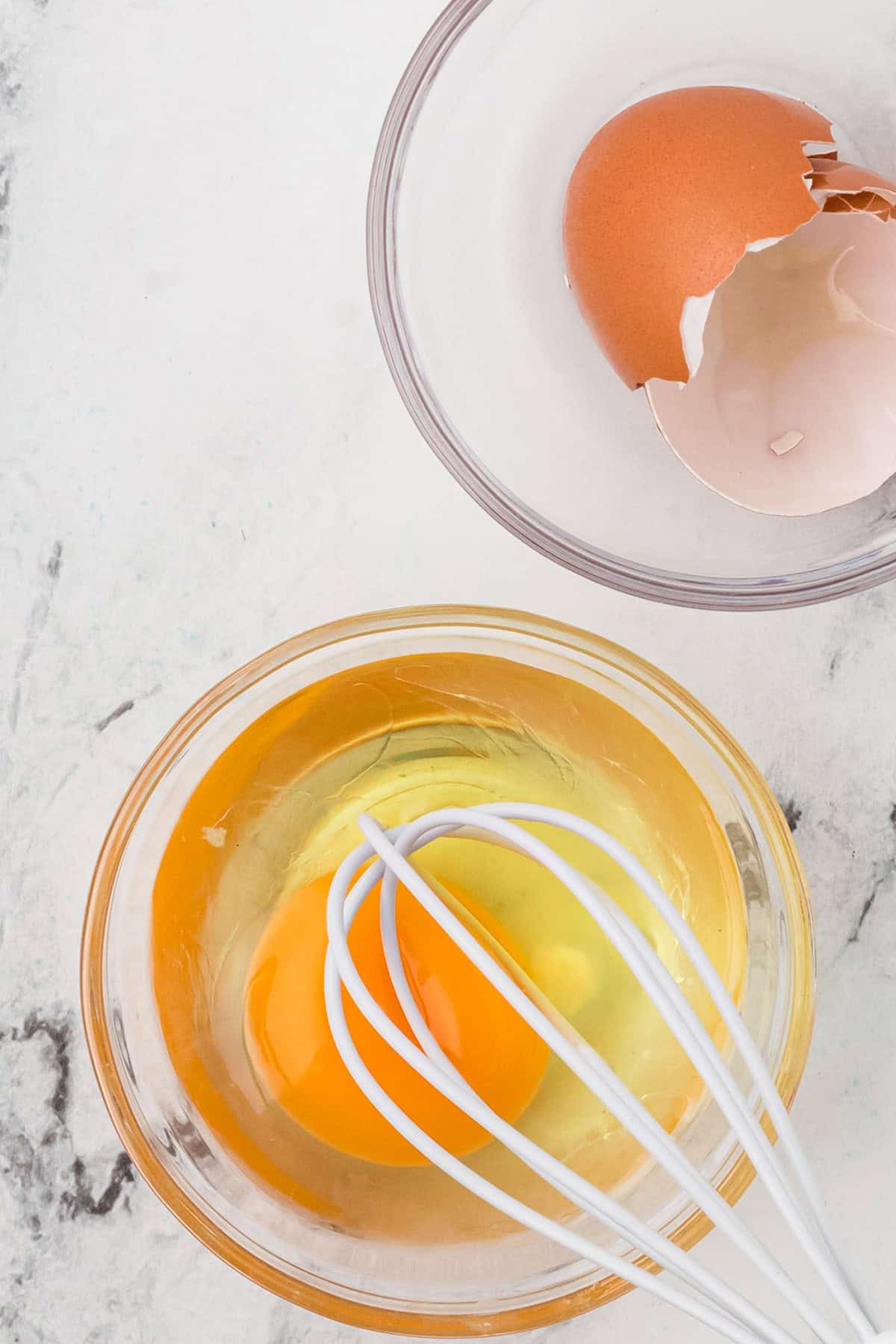 Egg and water in a bowl.
