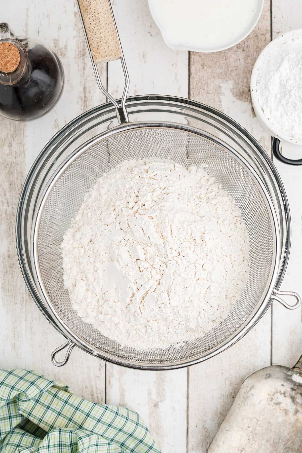 Sifting flour and salt.