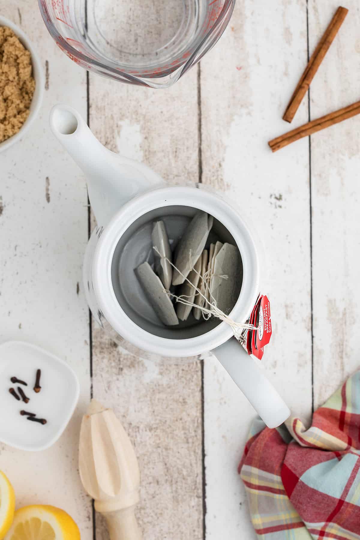 Tea bags in a tea pot.