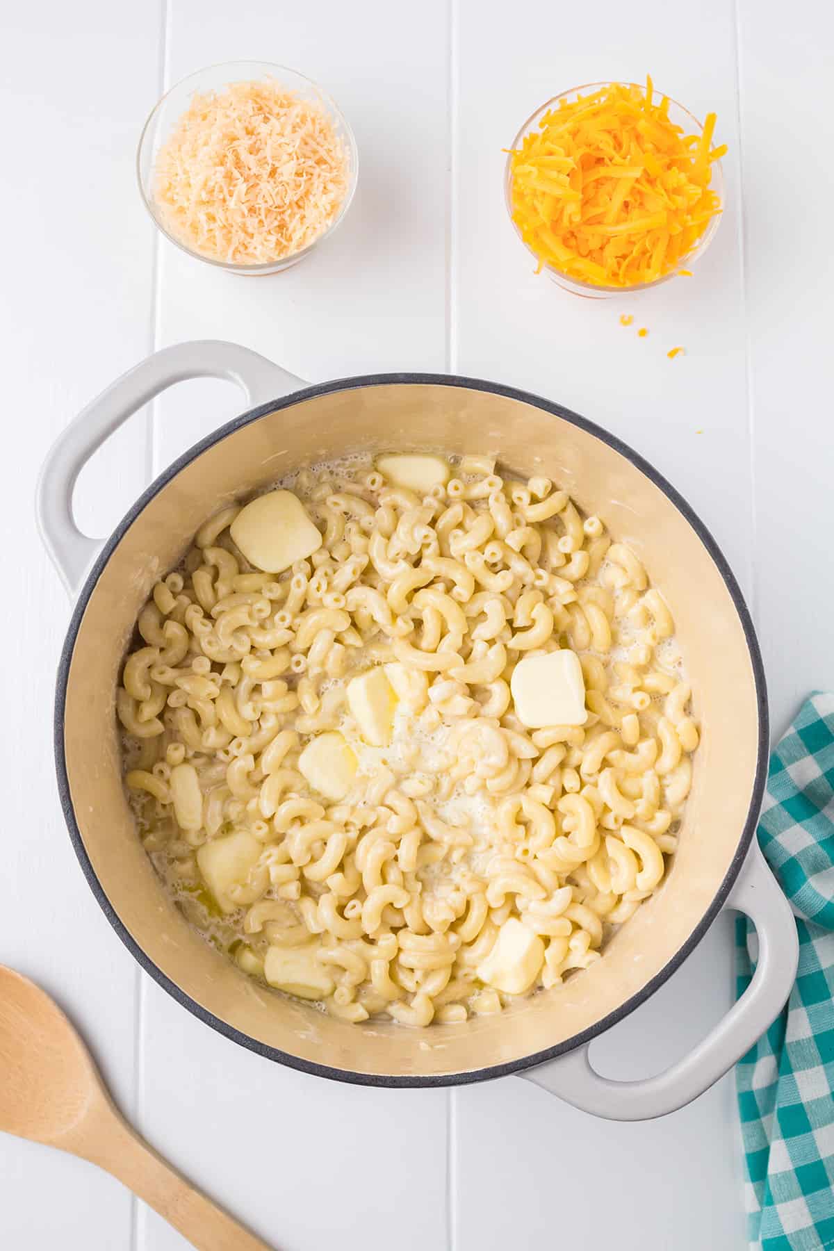 Butter added to warm cooked macaroni.