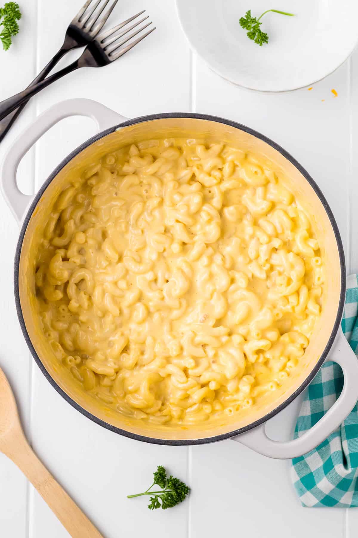 Cheeses and butter fully mixed with the macaroni.