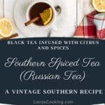 Three white cups of black tea with orange slices and cinnamon sticks, surrounded by teapots, lemons, and linens.