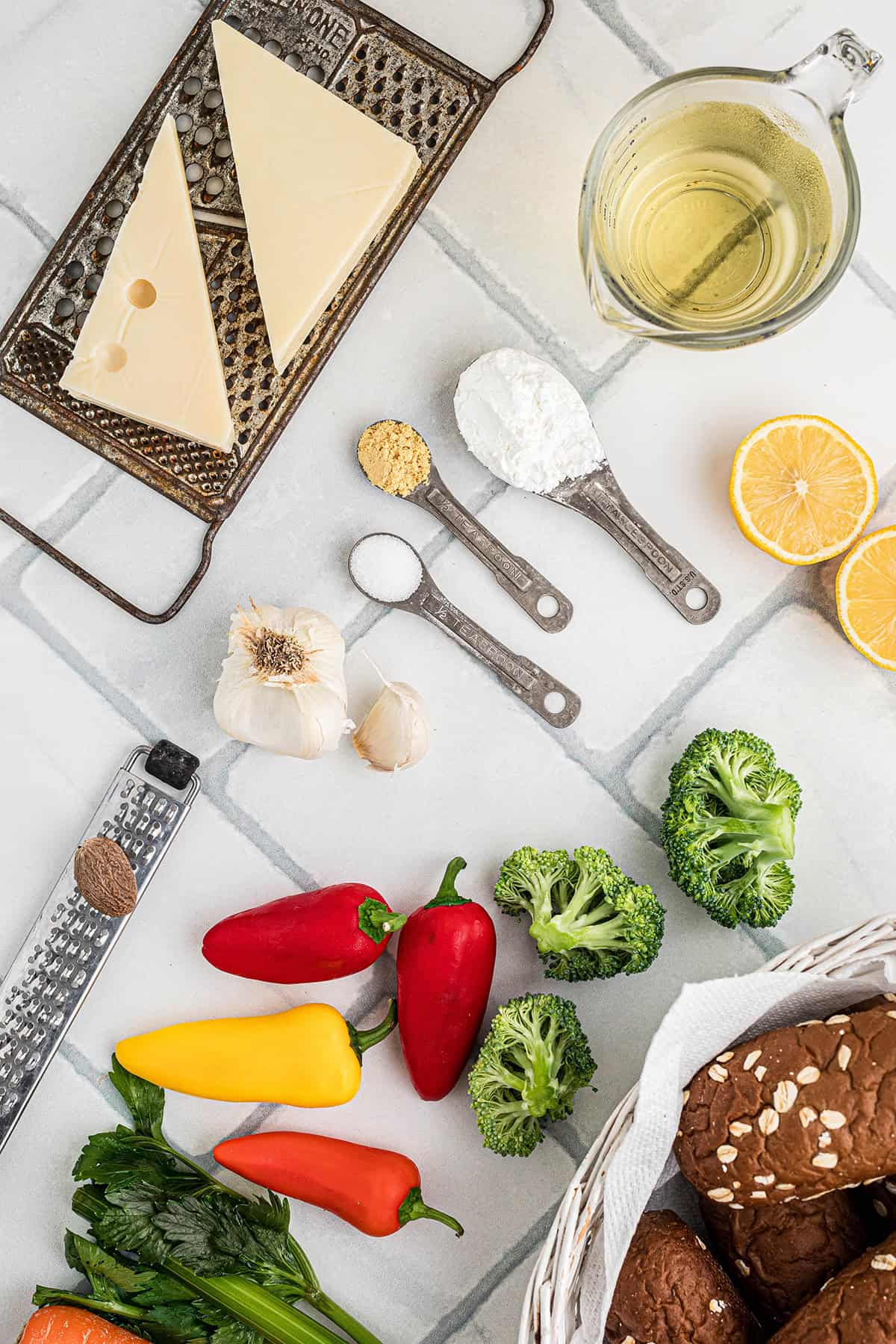 Ingredients needed to make classic cheese fondue.