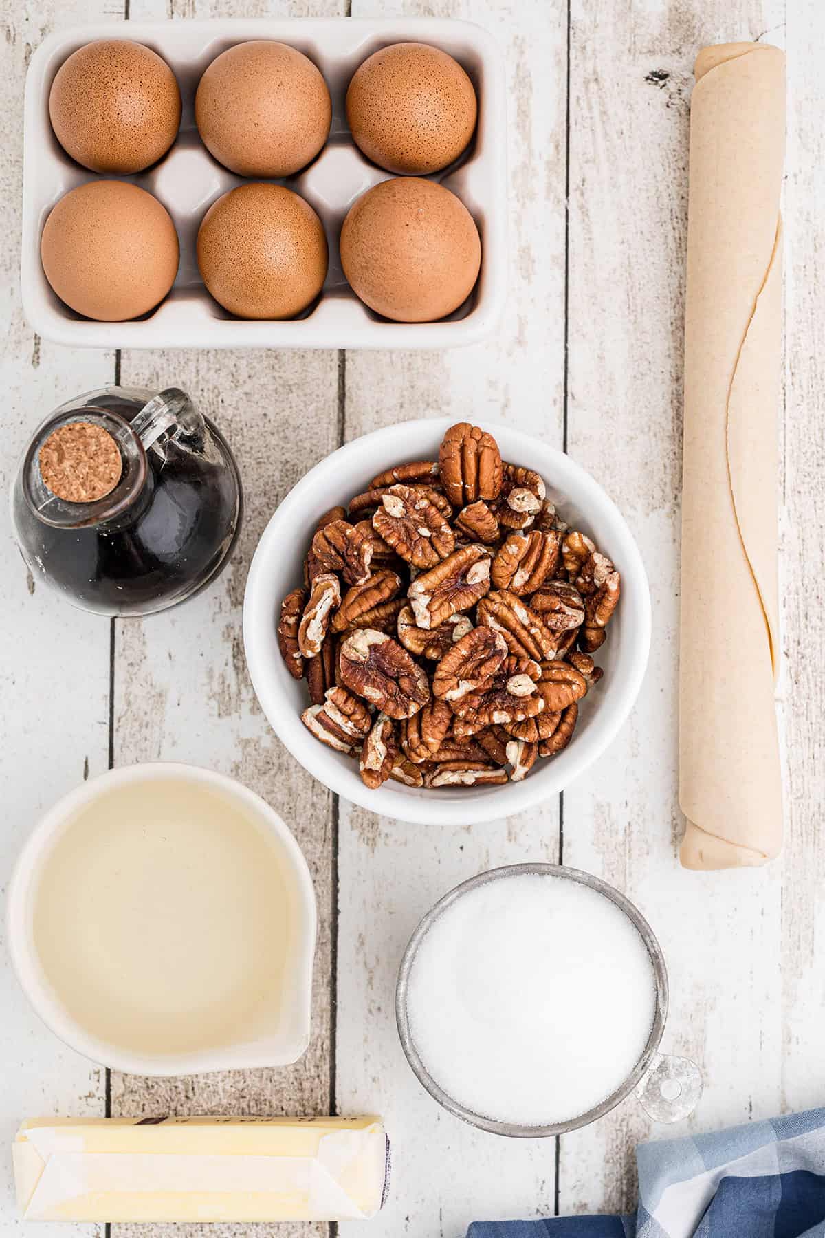 All the ingredients needed to make pecan pie.