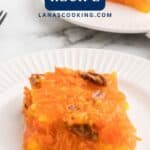 A square serving of orange sunshine salad with pecans on a white plate, with text “Sunshine Salad Recipe.”.