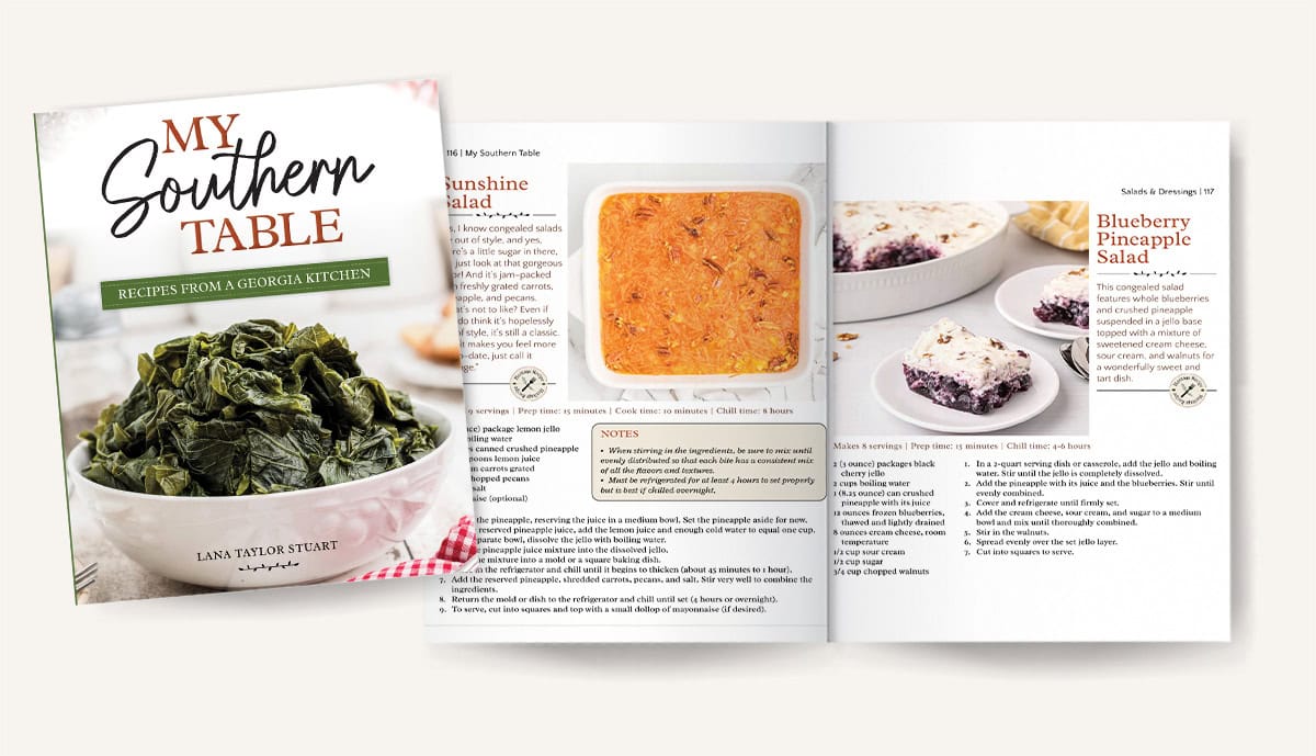 A cookbook titled My Southern Table beside an open page showing recipes and photos of dishes.