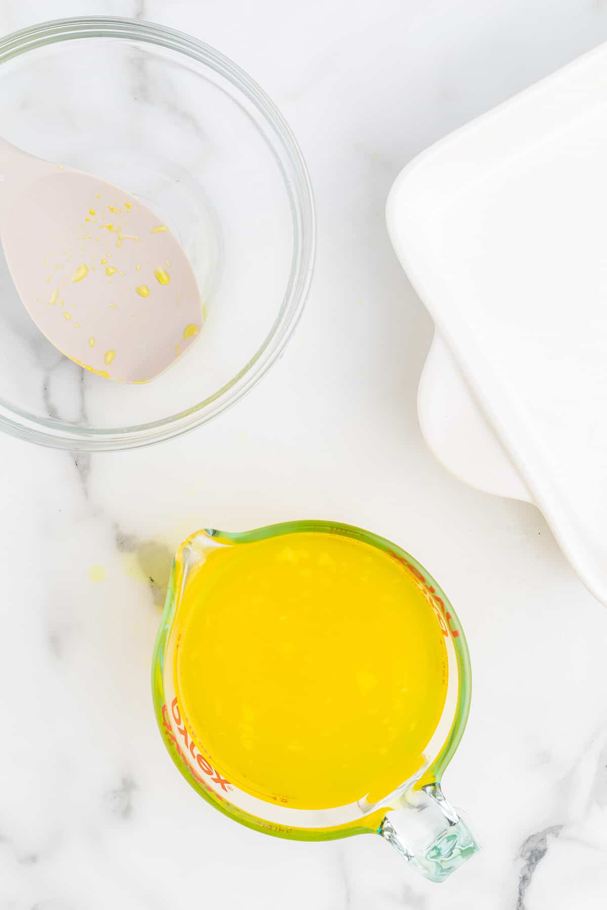 Pineapple juice added to dissolved jello.