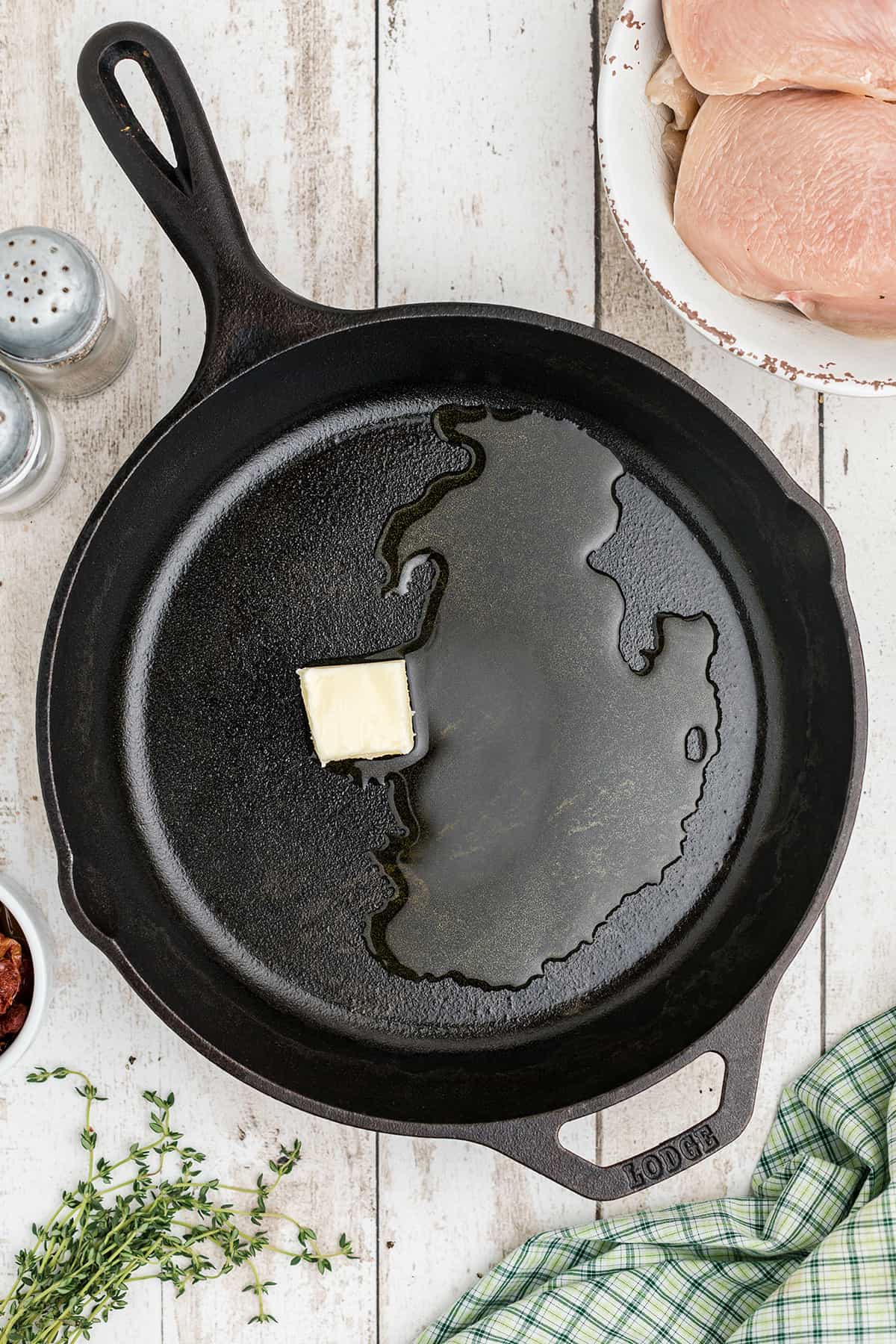 Butter and oil in a cast iron skillet.