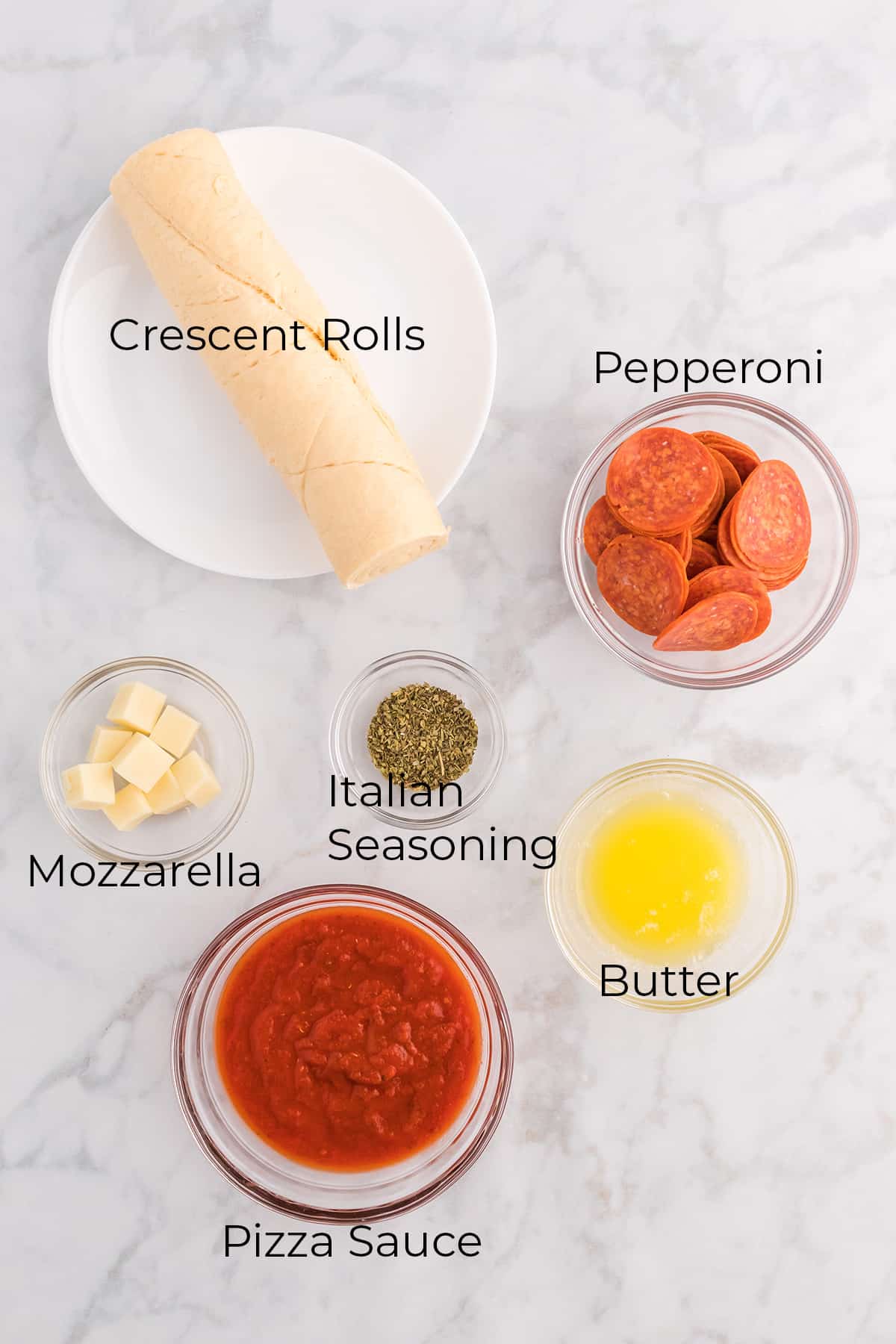 Ingredients needed to make pepperoni pizza rolls.