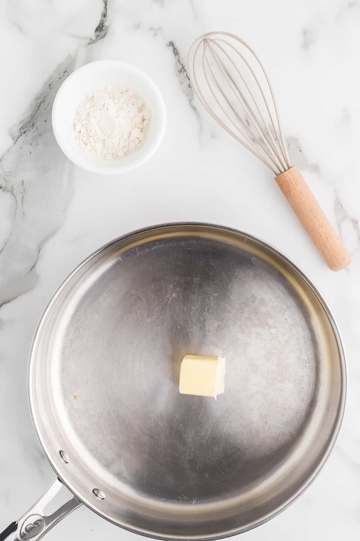 Butter melting in a skillet.