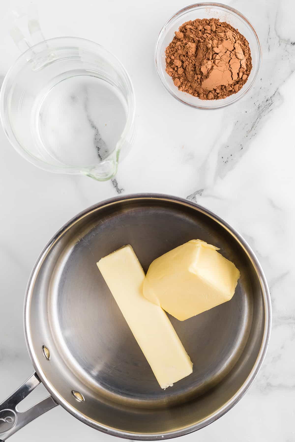 Butter and shortening in a saucepan.