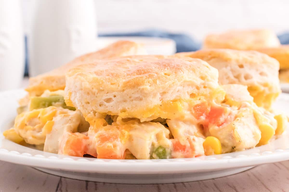 A serving of chicken pot pie casserole on a white plate.