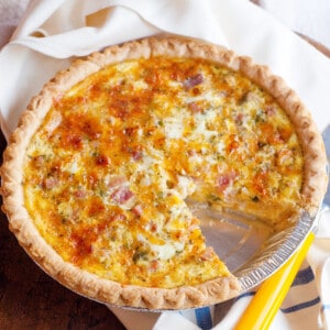 Finished quiche on a serving tray.