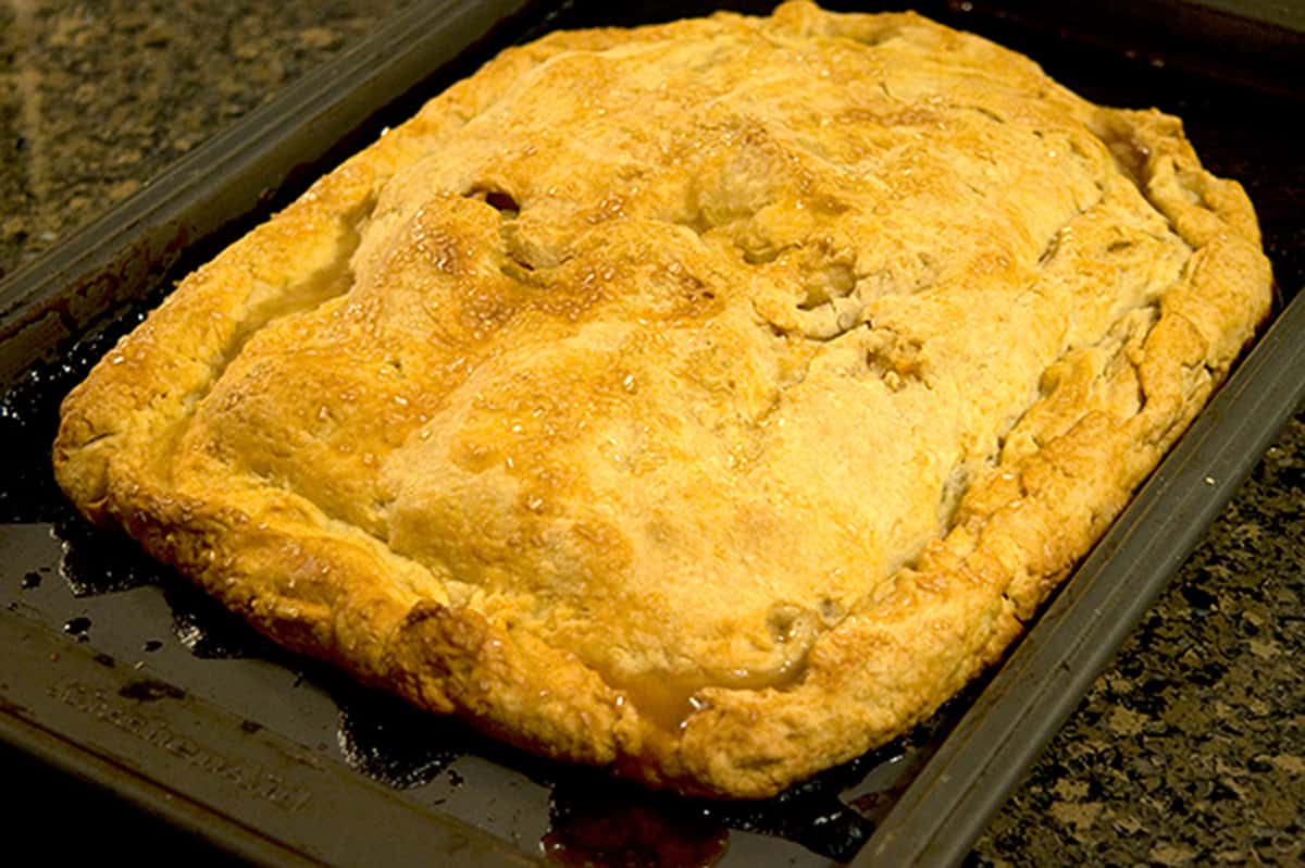 Finished pie on a baking sheet.