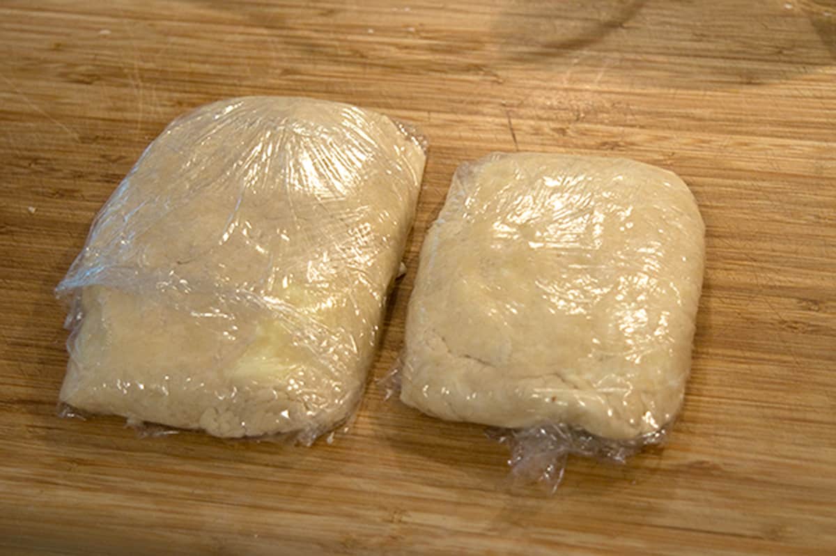Dough wrapped in plastic.