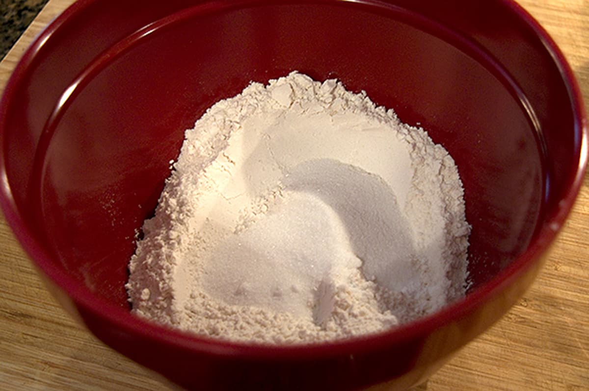 Dry ingredients measured into a mixing bowl.