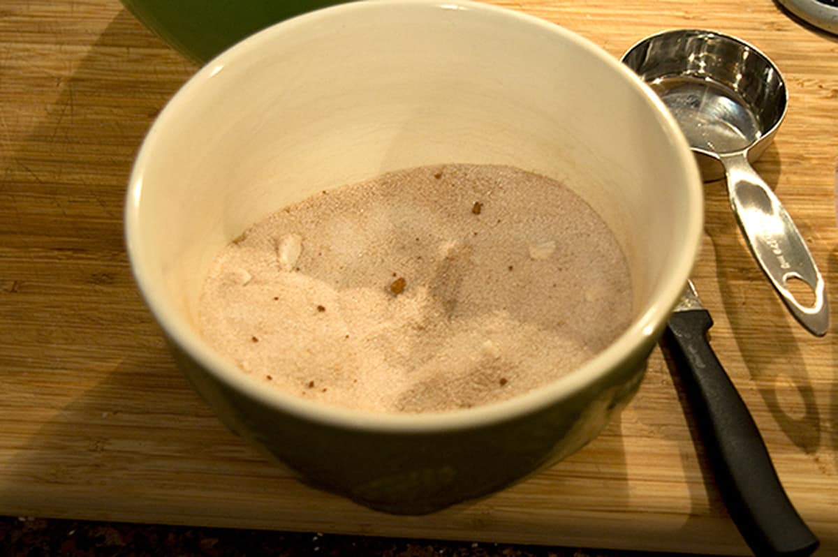 Sugar and spice mixture for pie filling in a bowl.