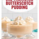 Three glass dishes of butterscotch pudding topped with whipped cream and coarse sugar in front of a white tile wall.