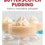 Three glass bowls of butterscotch pudding topped with whipped cream and sugar on a white surface.