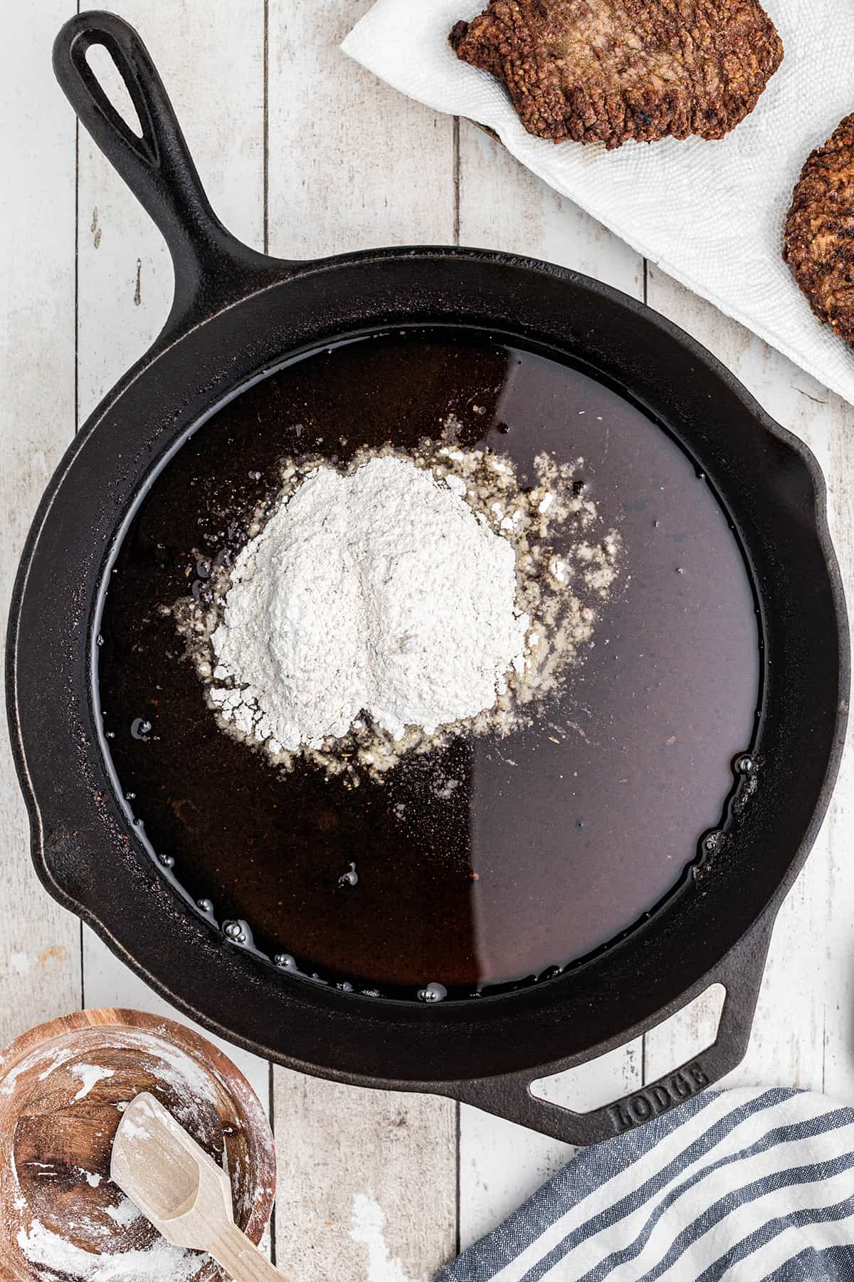 A skillet with oil and flour inside.