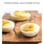 Three deviled eggs on a wooden board, with text Deviled Eggs Traditional Southern Style above.
