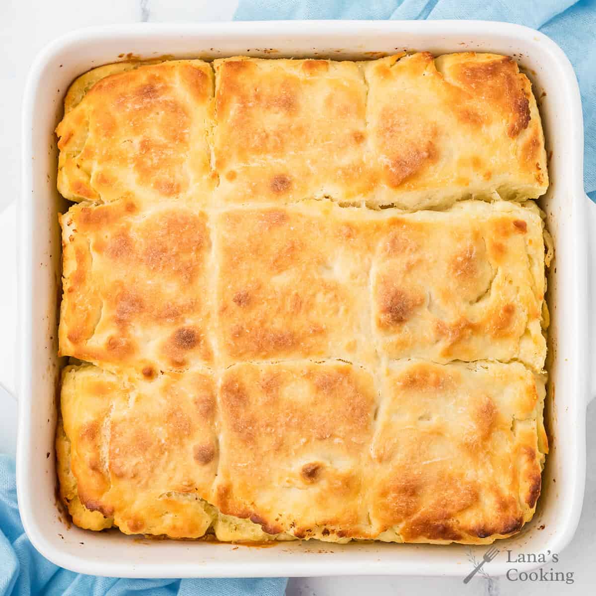 Finished butter swim biscuits cooling in the baking pan.