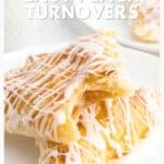 Golden peach turnovers with white icing on a white plate, text overlay promotes an easy recipe using puff pastry.