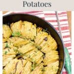Crispy roasted potatoes seasoned with herbs in a skillet.