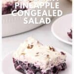 A slice of blueberry pineapple congealed salad with creamy topping on a white plate.