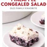 A slice of blueberry pineapple congealed salad with a creamy topping on a white plate.