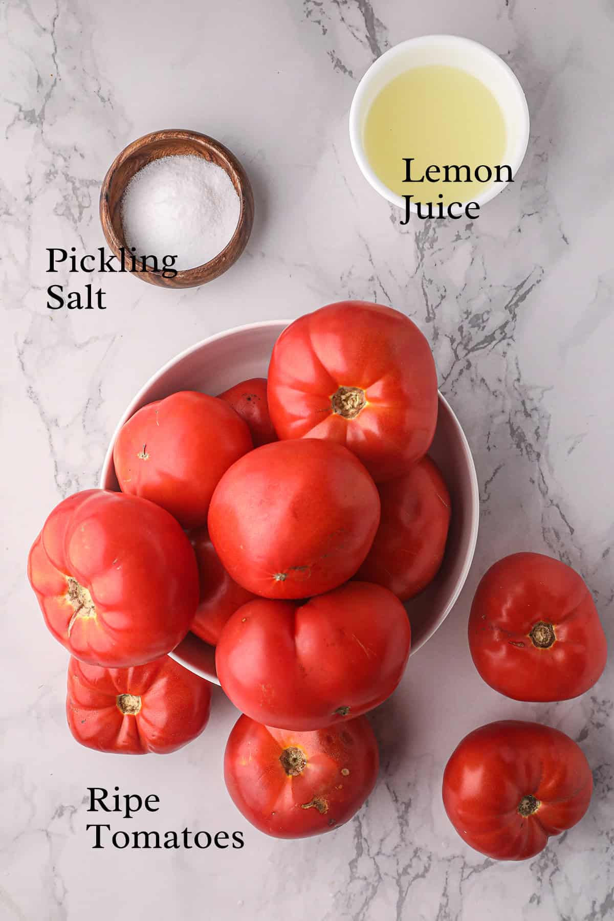 Ingredients needed to make home canned tomatoes.