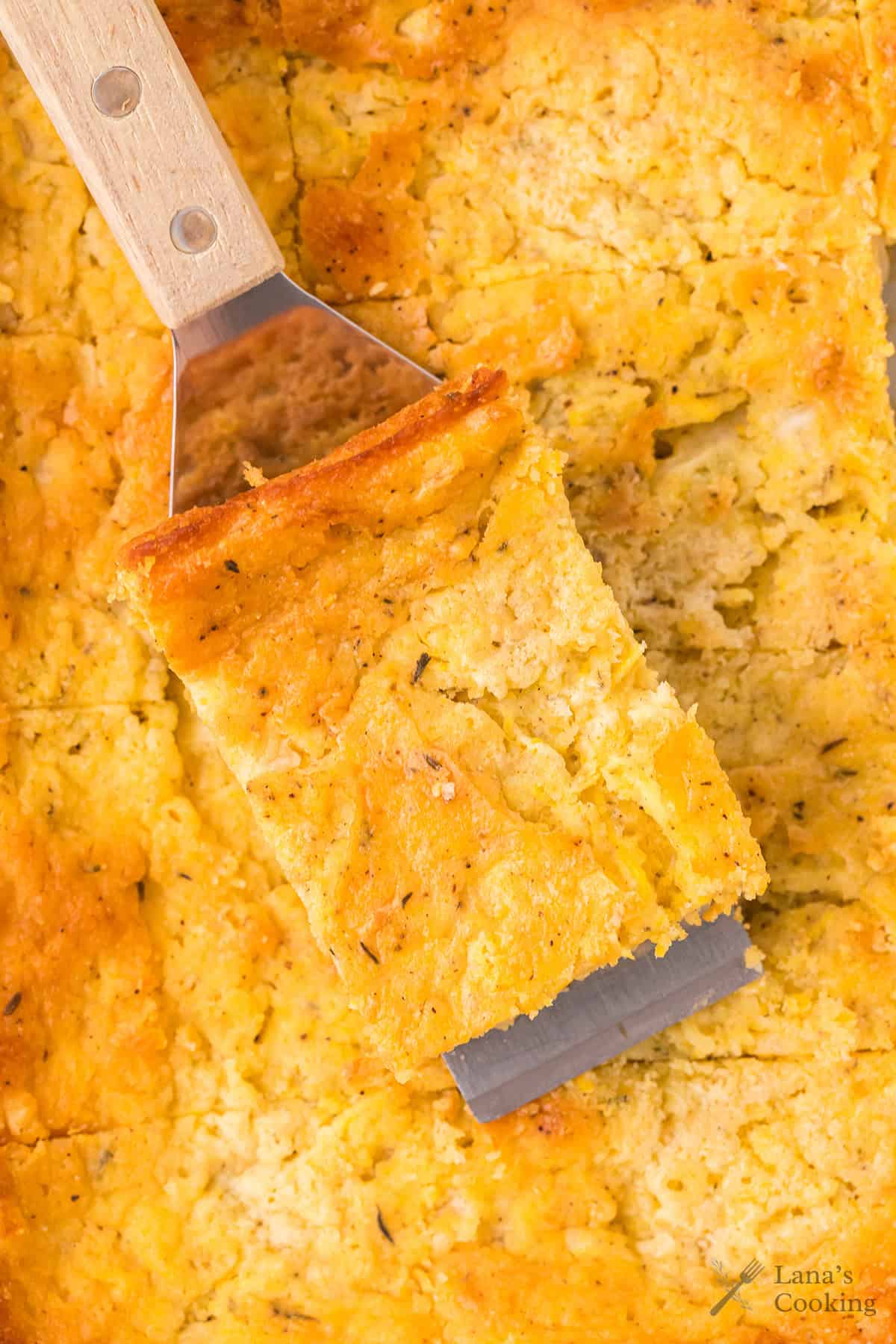 A slice of the finished recipe on a spatula.