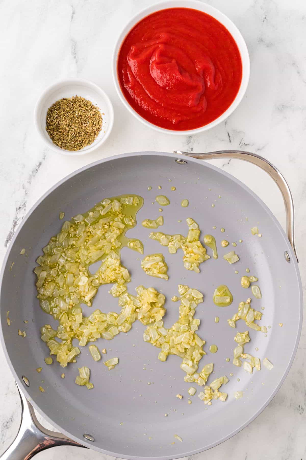Onions and garlic cooking in olive oil.