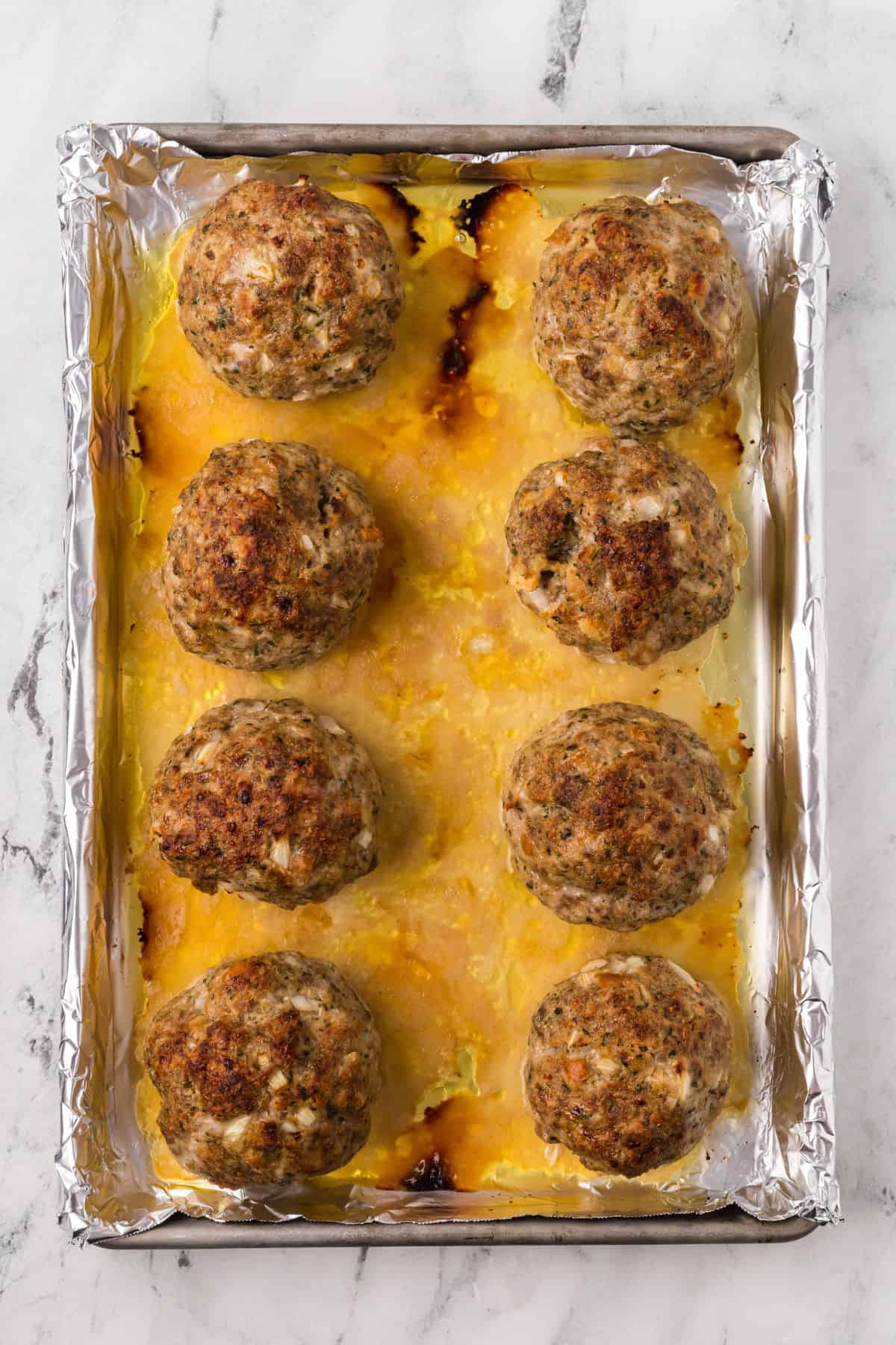 Golden brown baked meatballs.
