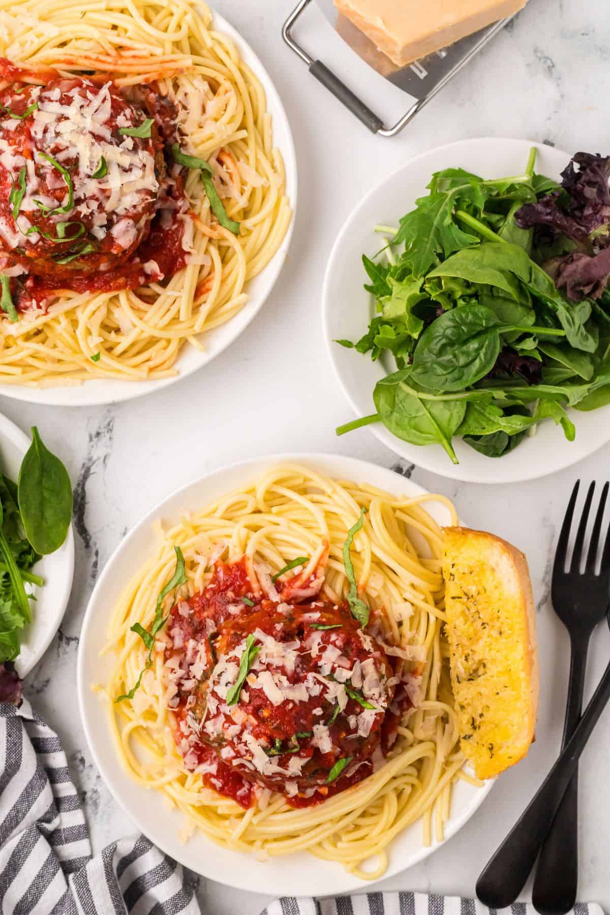 A serving of meatball and spaghetti.