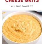 Bowl of creamy yellow cheese grits with pepper on top, text reads Southern Cheese Grits, All Time Favorite..