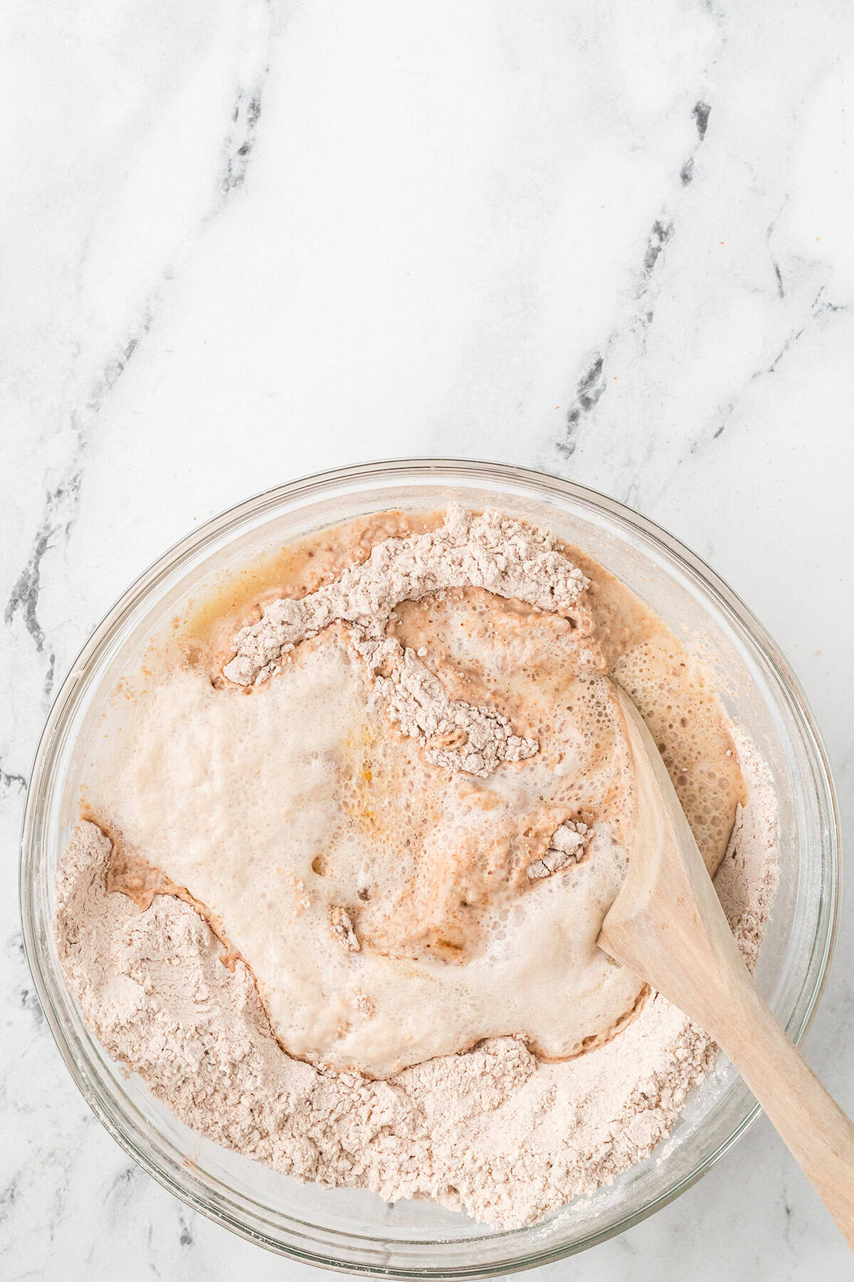 Yeast added to the mixing bowl.