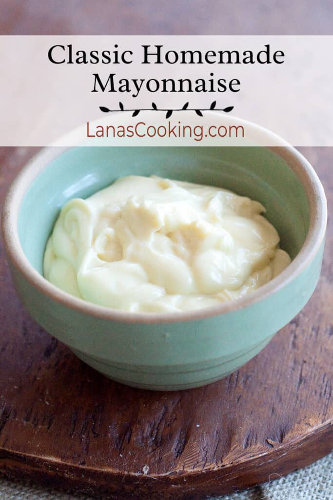 Finished homemade mayonnaise in a green vintage bowl.