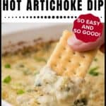 A hand dips a cracker into creamy hot artichoke dip in a white baking dish; text reads Hot Artichoke Dip.